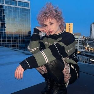 NEVSTUDIO Stripe Hole Sweater